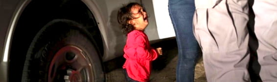 Child Crying By Truck